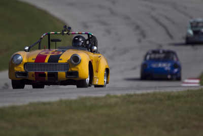 David Lee trying to break away in his 1969 Austin Healey Sprite