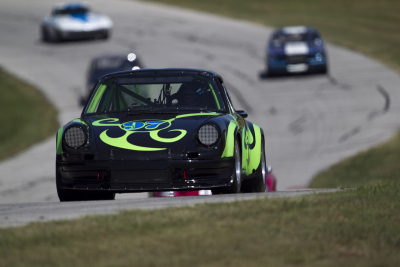 George Kopecky in his 1973 Porsche 911 RSR showing us his flair