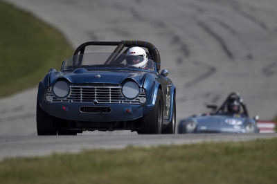 Bob Kramer in his 1962 Triumph TR4