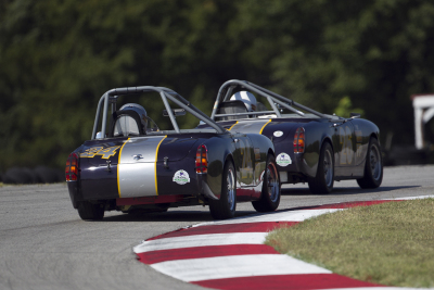 Mike and Steve Coleman tandem through Turn 4 at Hallett