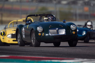 Lou Marchant and her 1959 MG A are always a classy pairing Lou Marchant and her 1959 MG A are always a classy pairing