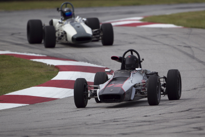 Gerry Tussing in his 1972 Titan Mk6 trying to hold off a Brabham BT21 Formula B Gerry Tussing in his 1972 Titan Mk6 trying to hold off a Brabham BT21 Formula B