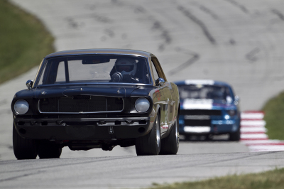 Ross Mussina chased by Bobby Whitehead in thier respective Mustangs