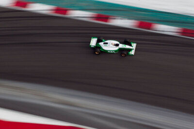 Ben Sinnott up to speed in the Team Kool Green Lola T97 at COTA Ben Sinnott up to speed in the Team Kool Green Lola T97 at COTA