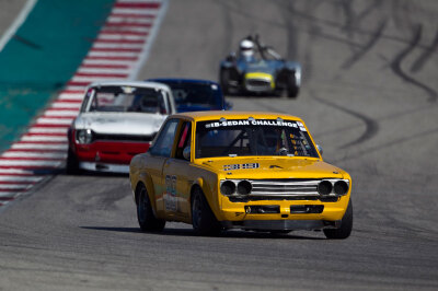 Donnie Cluck holding off Stuart Blackwood at Turn 20 Donnie Cluck holding off Stuart Blackwood at Turn 20