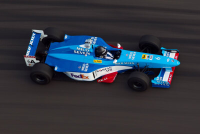 1998 Benetton B198 at speed under the COTA tower 1998 Benetton B198 at speed under the COTA tower