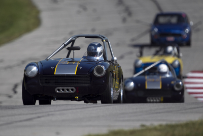 Steve Coleman leads up the hill in his 1972 MG Midget