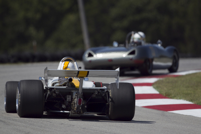 Nick Leonard chasing Jim Gewinner around Turn 4 at Hallett