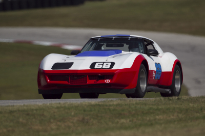 Marty Baker in his 1969 Chevy Corvette looking patriotic