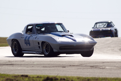 George Wright and his 1963 Corvette into Turn 2 at Hallett
