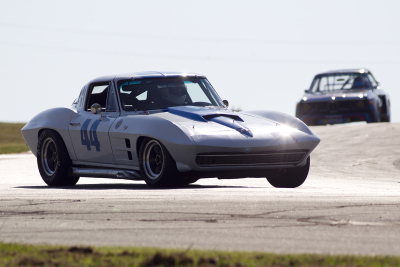 George Wright and his 1963 Corvette into Turn 2 at Hallett George Wright and his 1963 Corvette into Turn 2 at Hallett